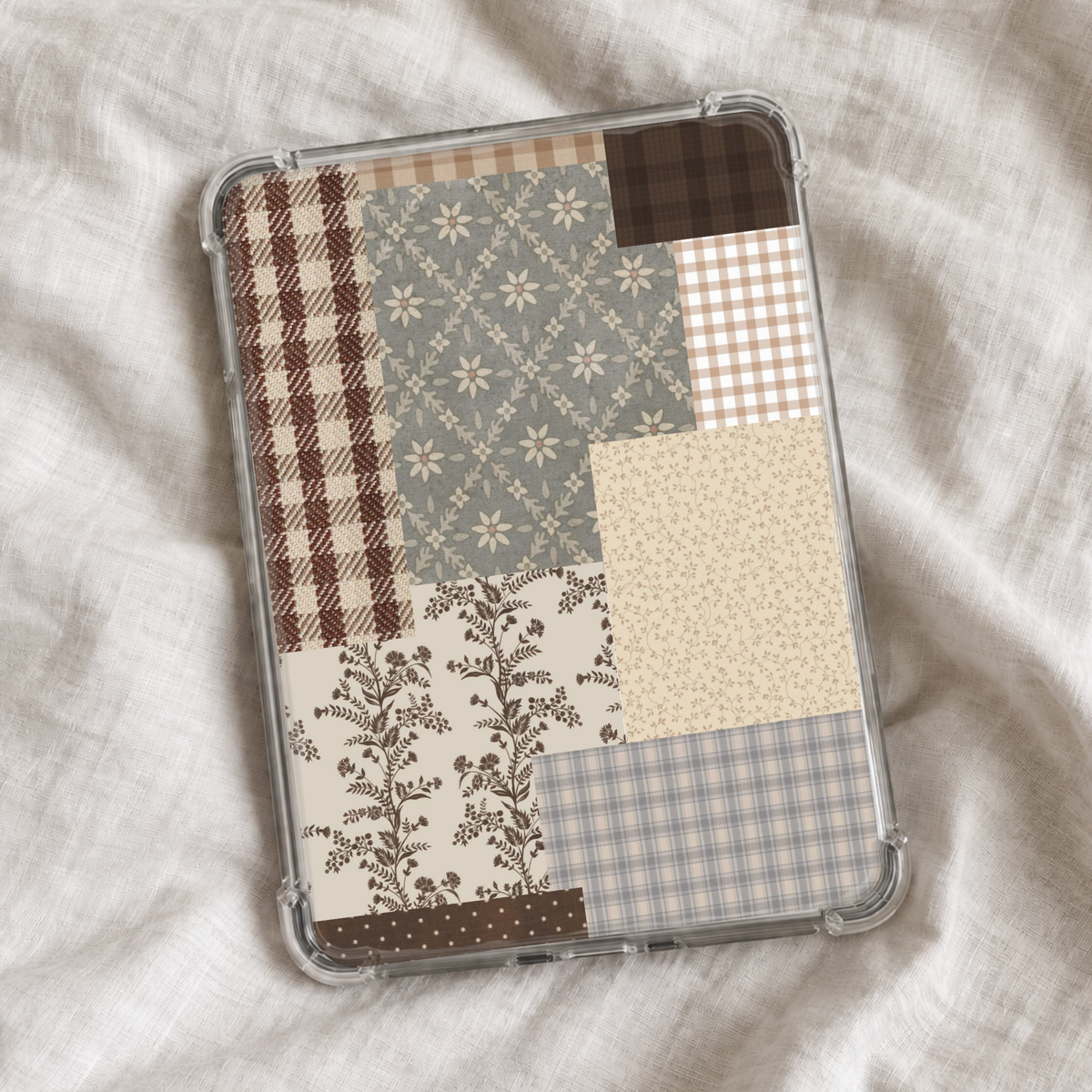 Neutral cottagecore Kindle insert featuring a patchwork collage of vintage floral prints, gingham, plaid, and textured patterns in soft brown, cream, sage green, and muted blue tones.