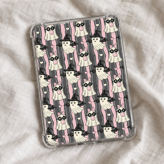 Cute girly Halloween Kindle insert featuring playful ghosts in witch hats, pink bows, hearts, bats, and spiderwebs on a wavy pink and charcoal striped background.